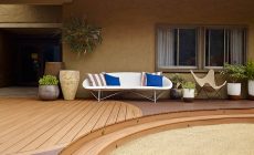 trex transcend decking tiki torch lava rock closeup step